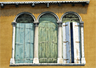 A watercolour painting of shuttered windows in Venice by Margaret Heath RSMA.
